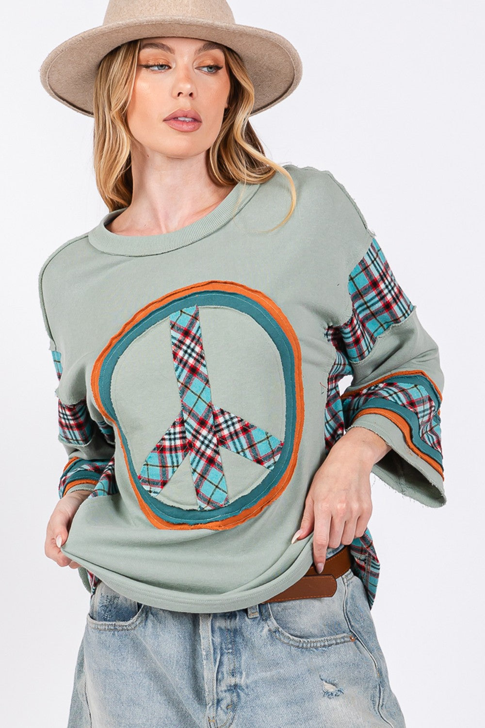 Ariana | SAGE + FIG top with peace appliqué patch and contrast check