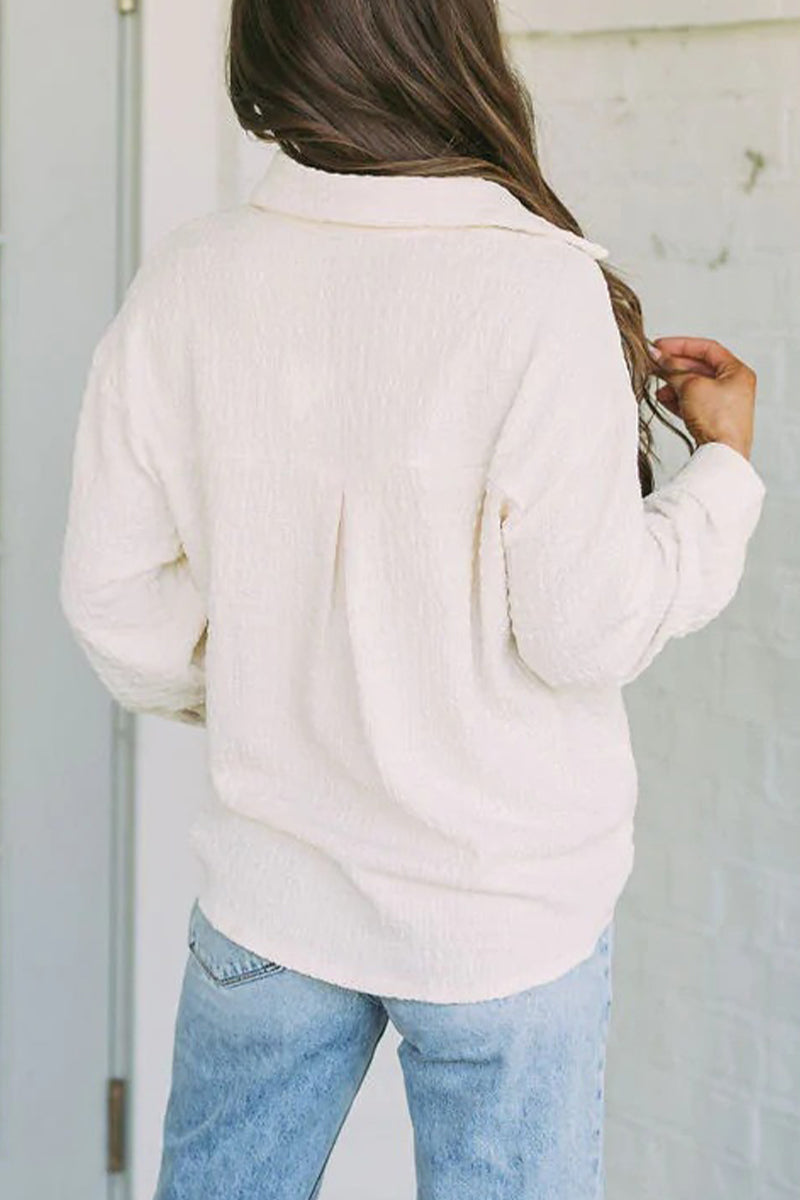 Olga | Simple tops with a plain turn-down collar and pockets
