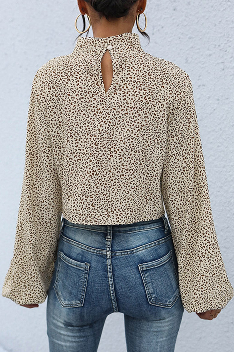 Nelly | Casual turtleneck tops with asymmetrical leopard print