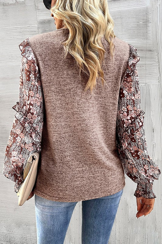 Aitana | Ruffled blouse with tiered floral sleeves and round neckline