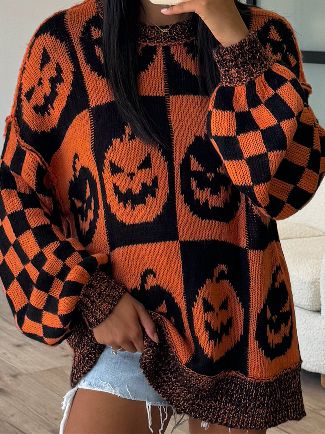 Estrella | Pumpkin long sleeve sweater with exposed seam and crew neck