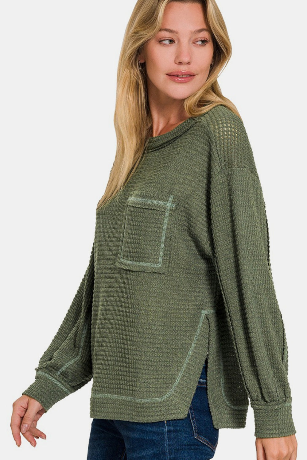 Flavia | Long sleeve top with exposed seam and side slit