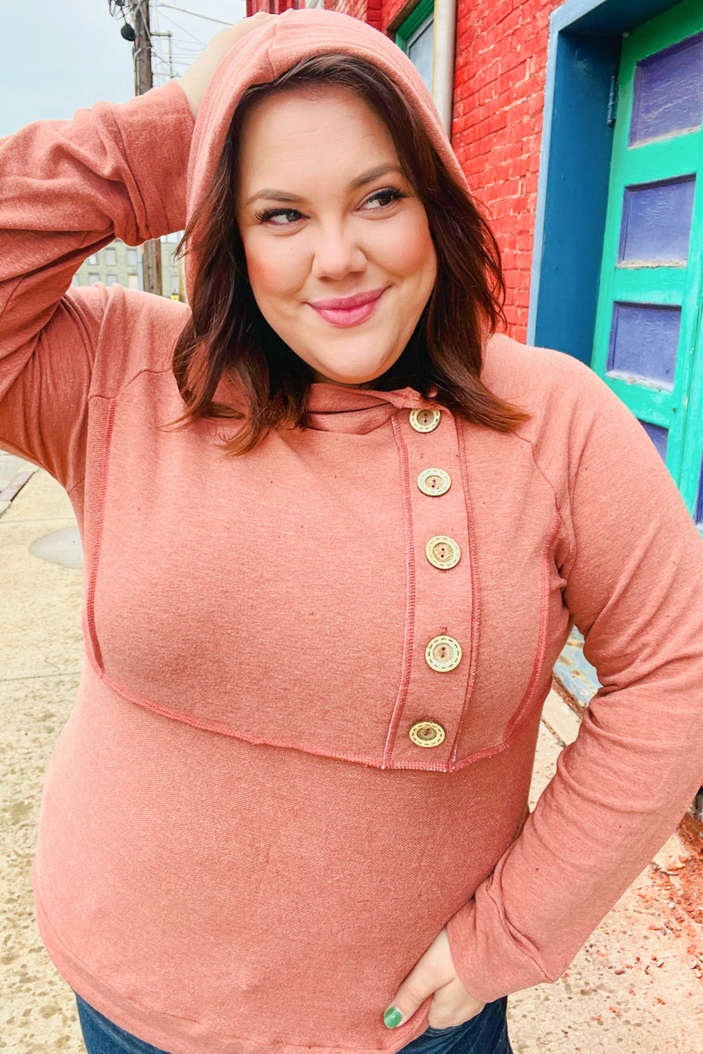 Elsa | Rust colored princess hoodie with line-out seam and button placket