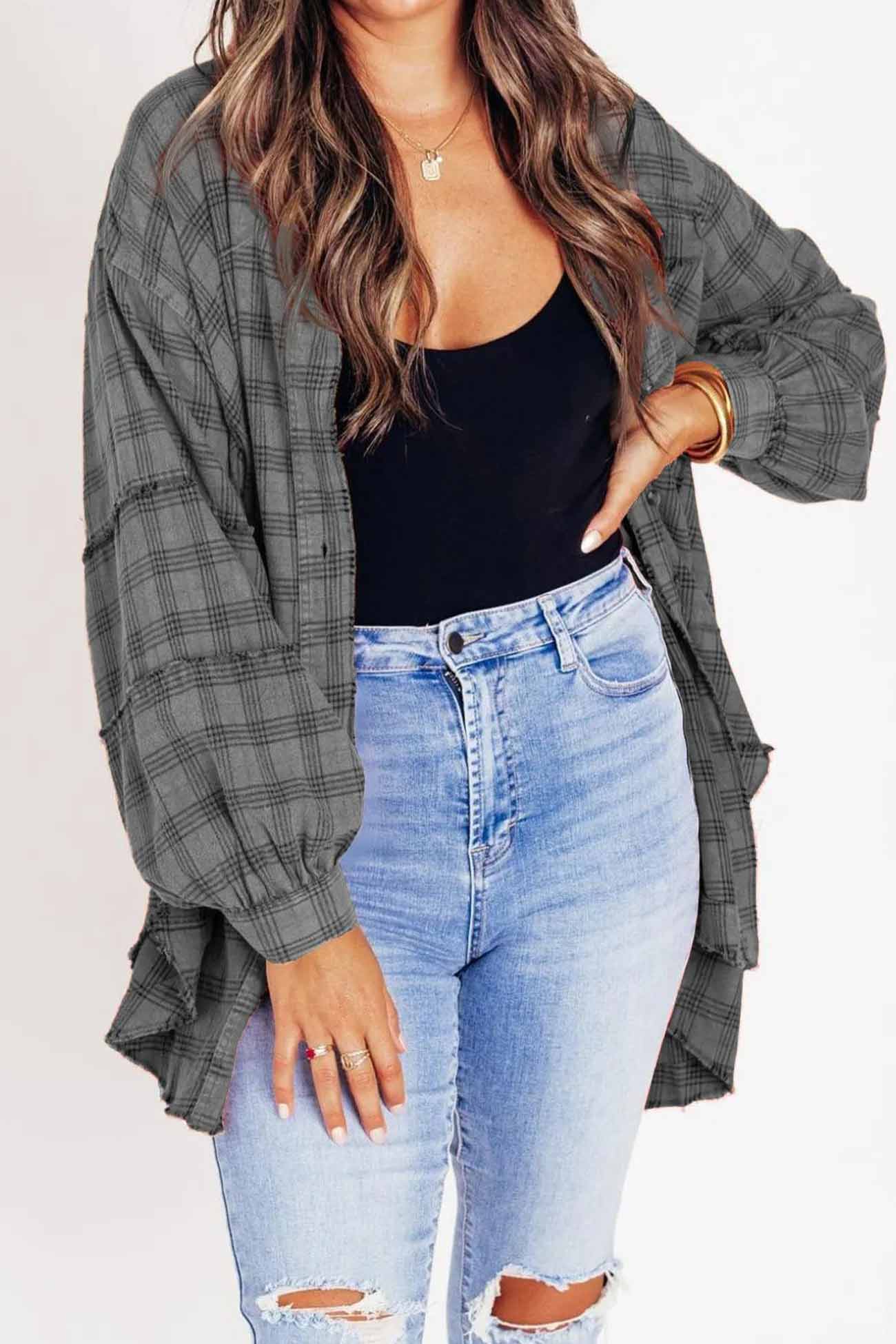 Vanja | Checked blouse with button placket, fringes and slit hem