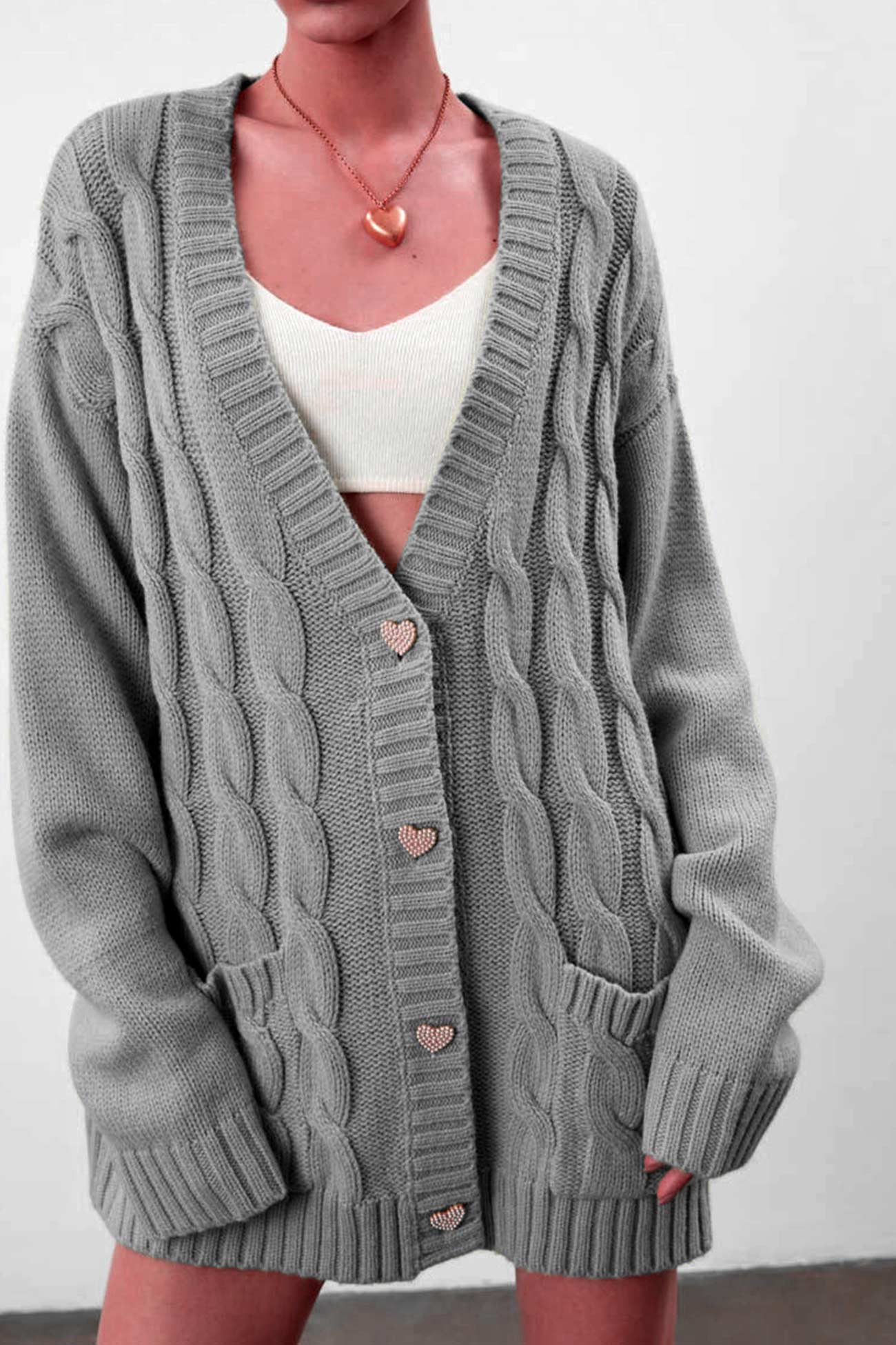 Pilar | Solid single breasted cable knit cardigan