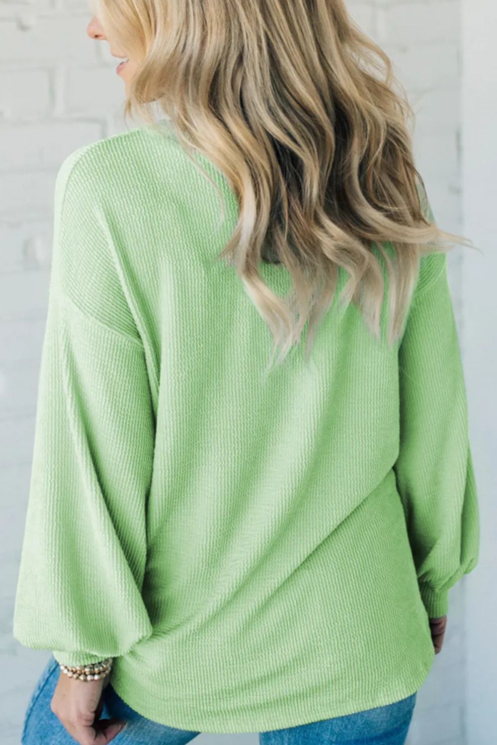 Nerea | Structured top with a round neckline and dropped shoulders