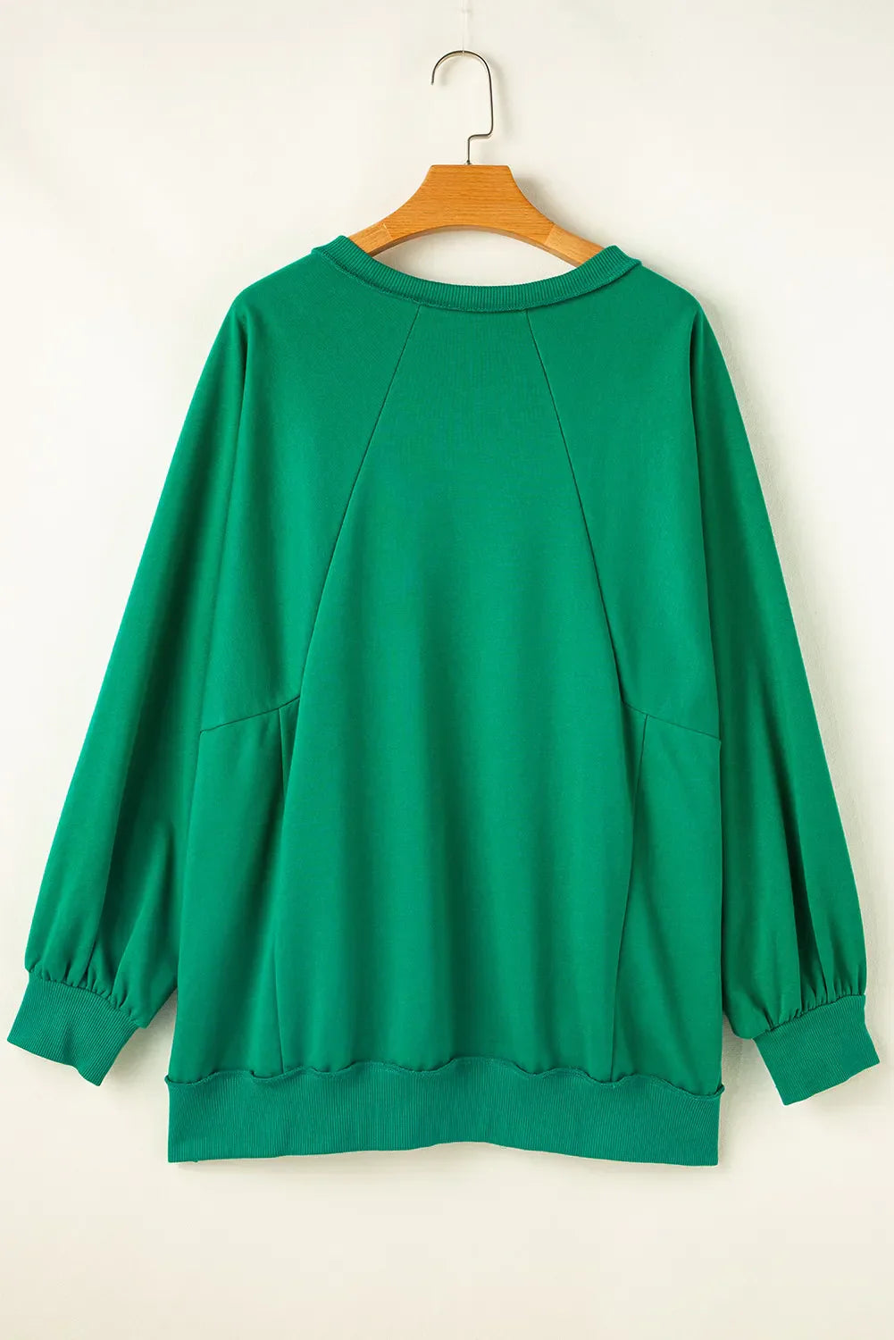 Yvonne | Plus size long sleeve sweatshirt with cutout hem and notched hem