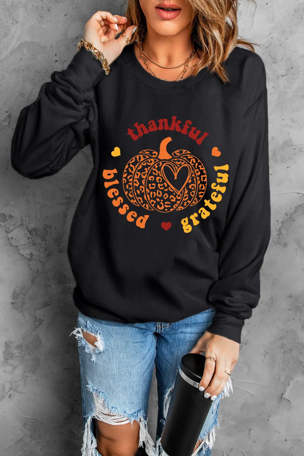 Olga | Long-sleeved sweatshirt with a pumpkin graphic