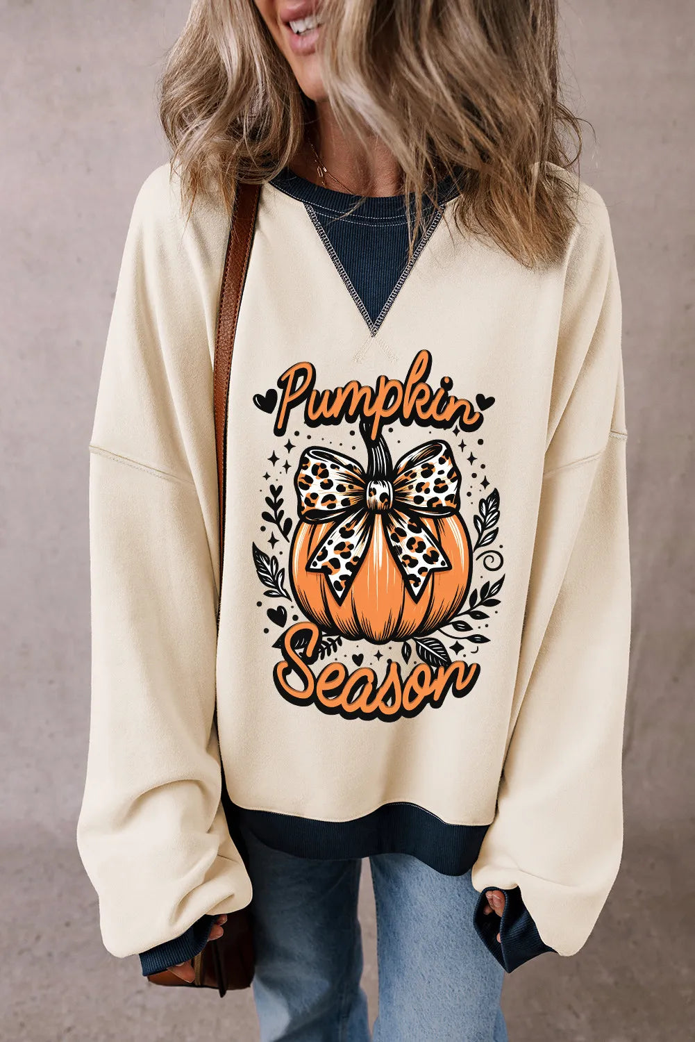 Lara | Long-sleeved sweatshirt with a pumpkin graphic