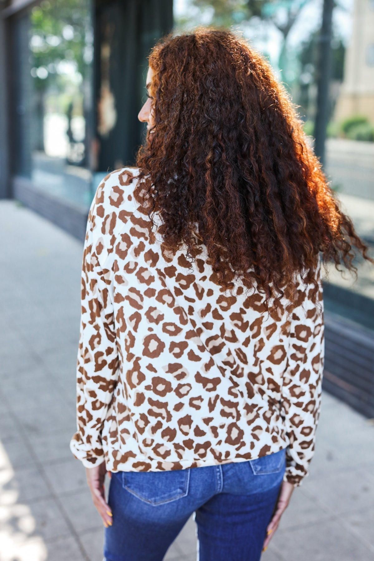 Gitta | Standout animal print hoodie in taupe
