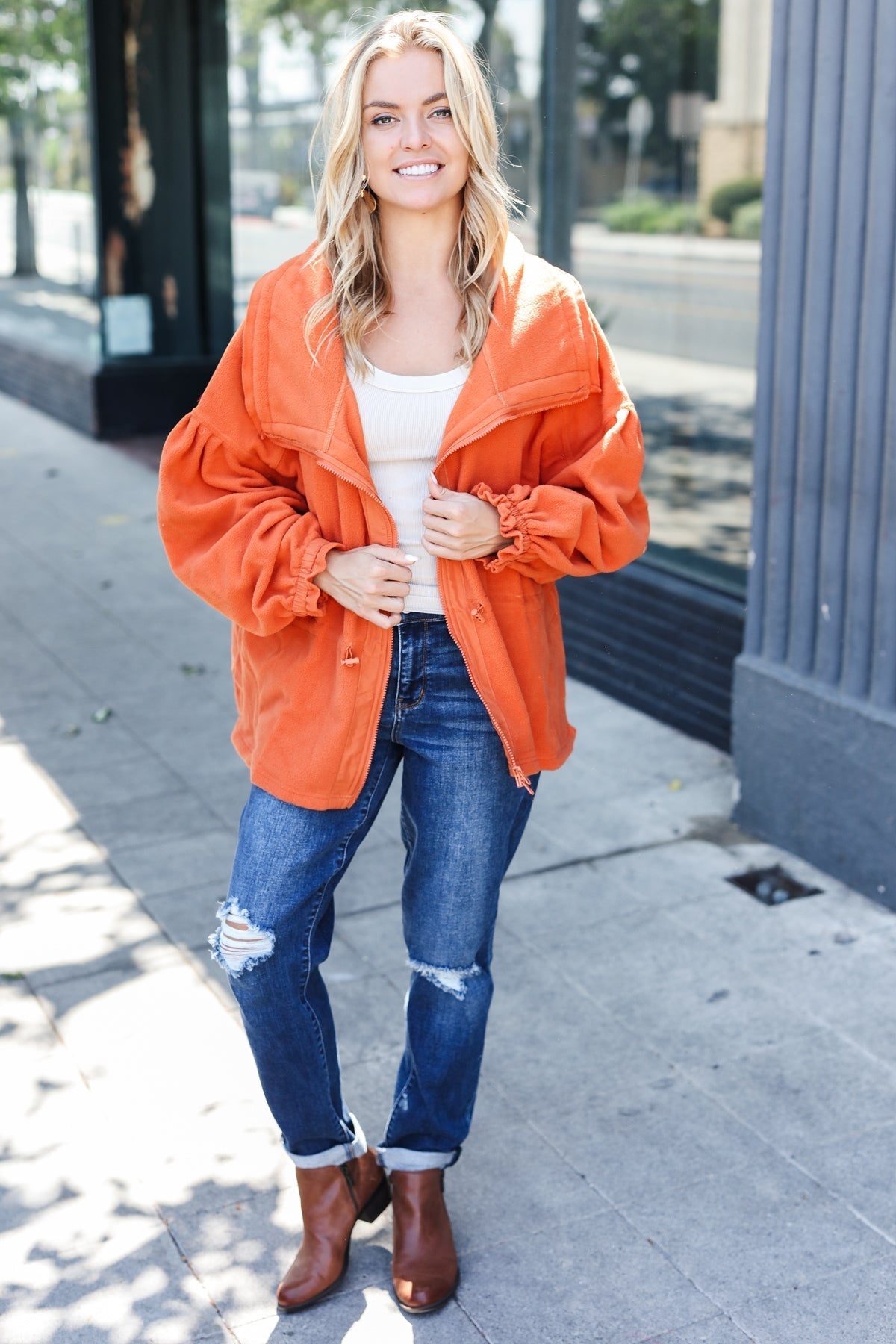 Xaviera | Beautiful You Rust fleece jacket with a fitted waist and zip fastening