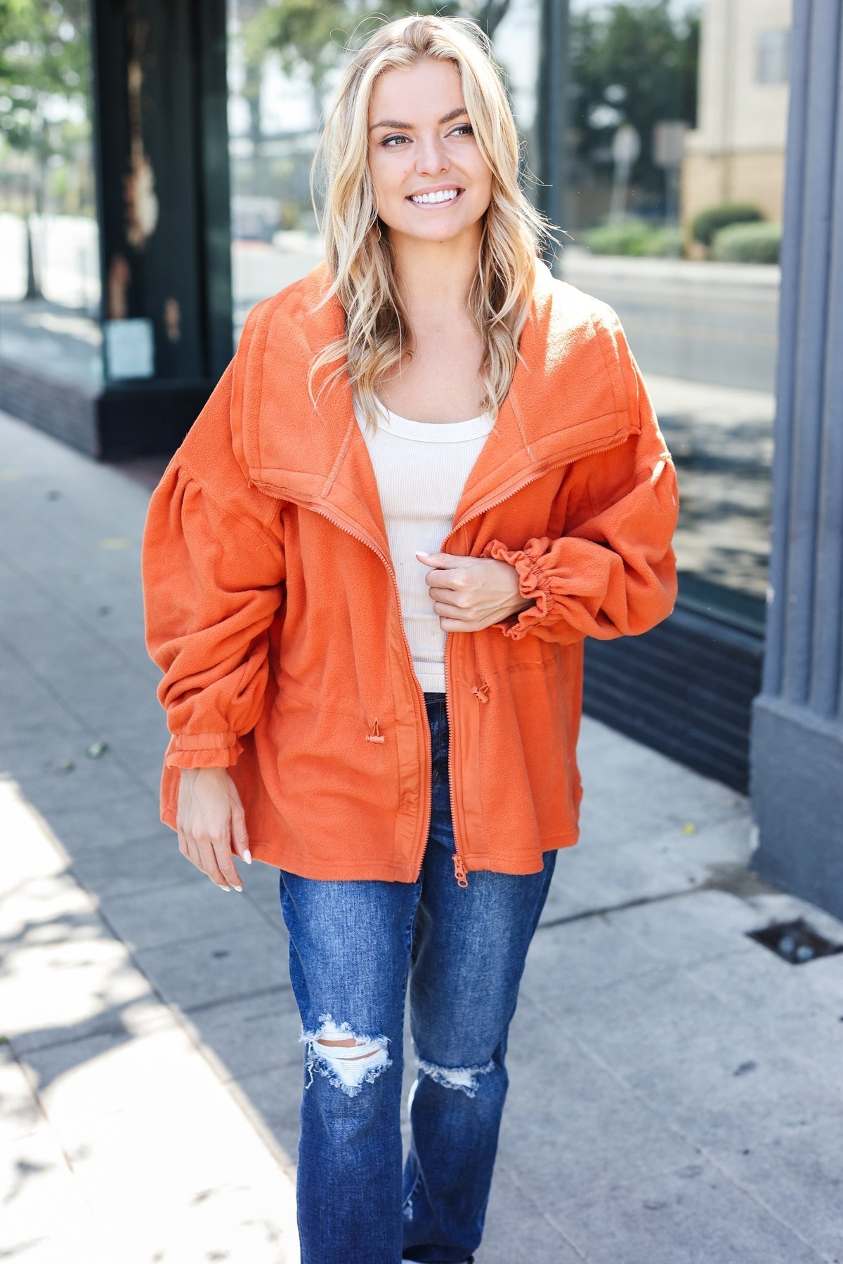 Xaviera | Beautiful You Rust fleece jacket with a fitted waist and zip fastening