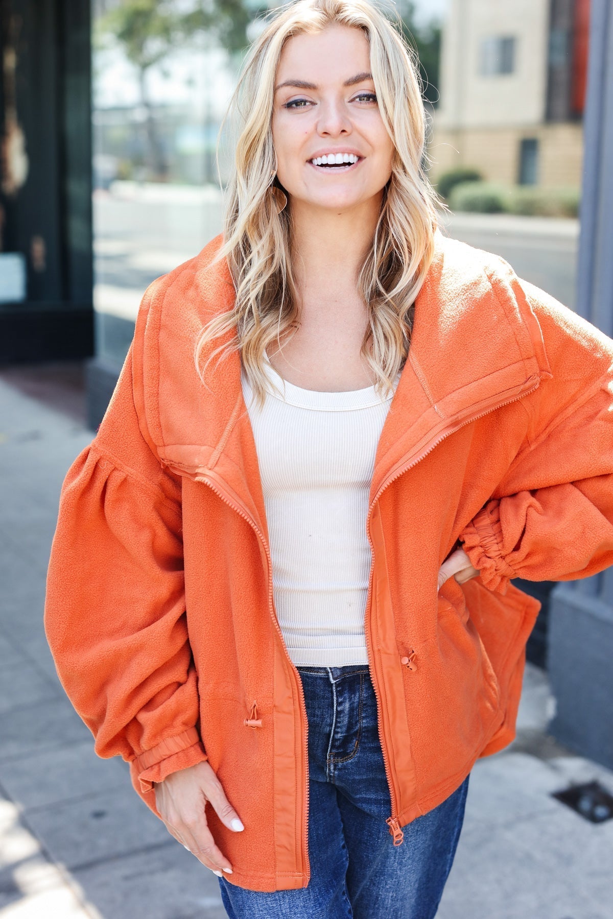 Xaviera | Beautiful You Rust fleece jacket with a fitted waist and zip fastening