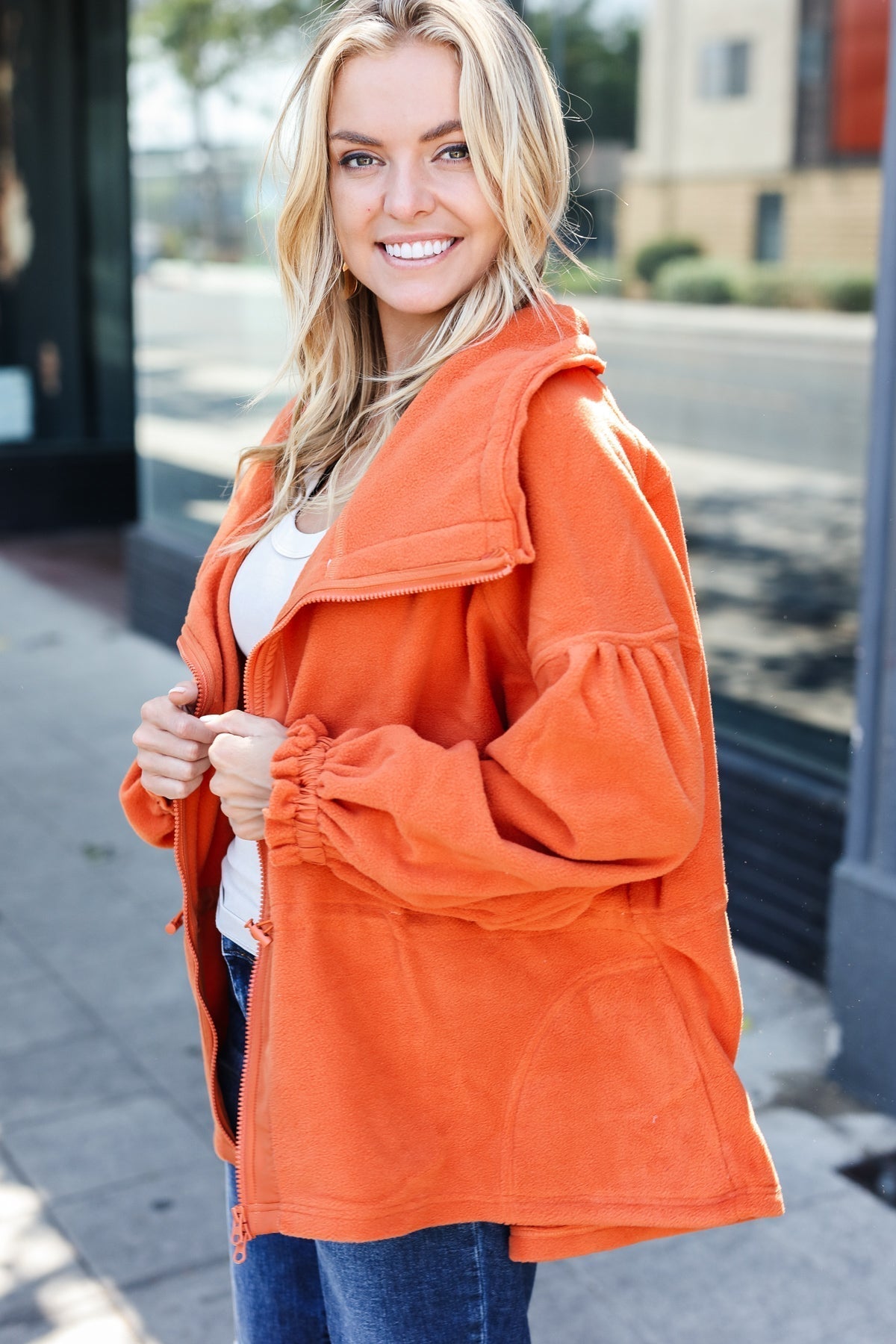 Xaviera | Beautiful You Rust fleece jacket with a fitted waist and zip fastening