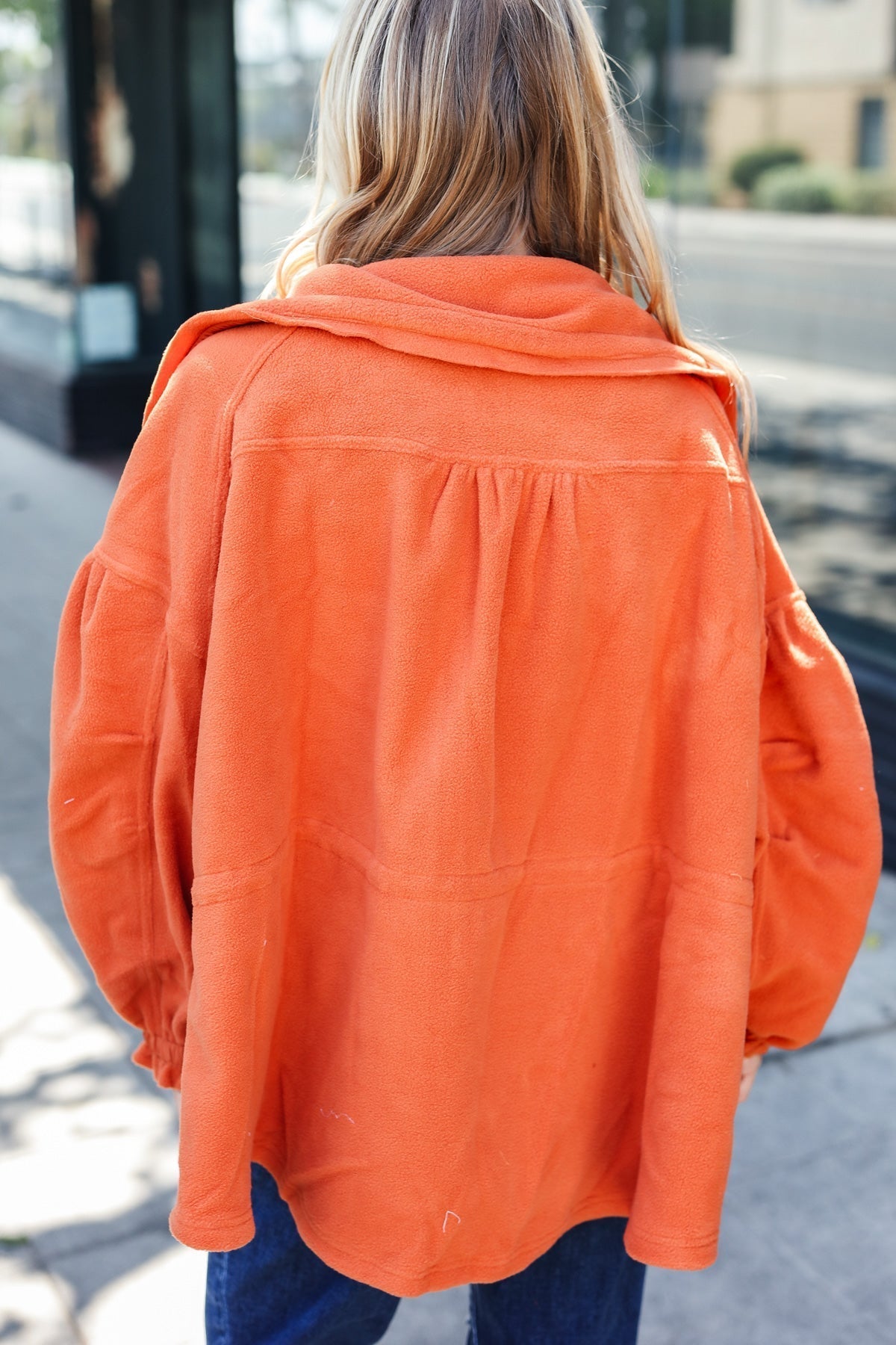 Xaviera | Beautiful You Rust fleece jacket with a fitted waist and zip fastening
