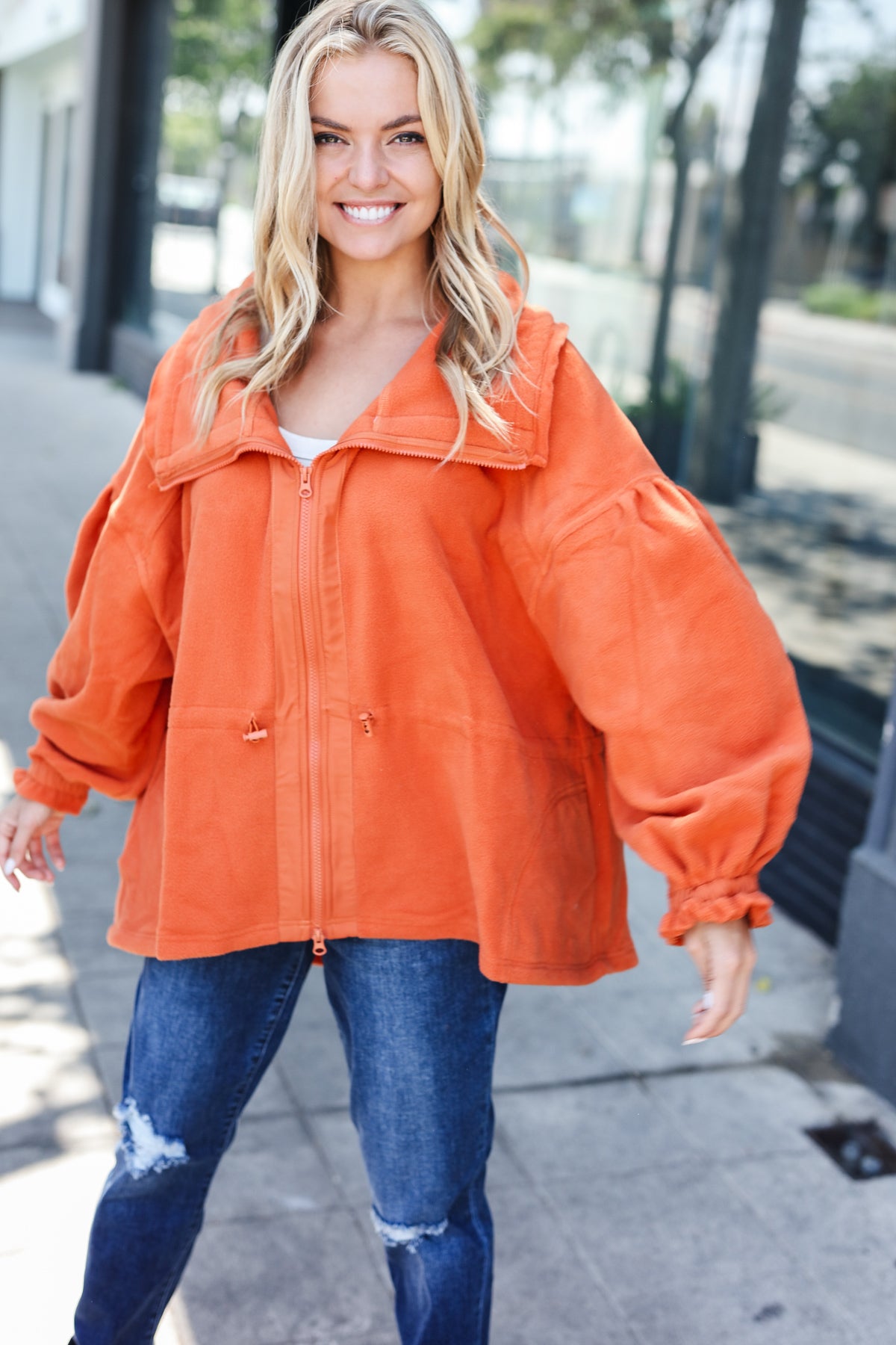 Xaviera | Beautiful You Rust fleece jacket with a fitted waist and zip fastening