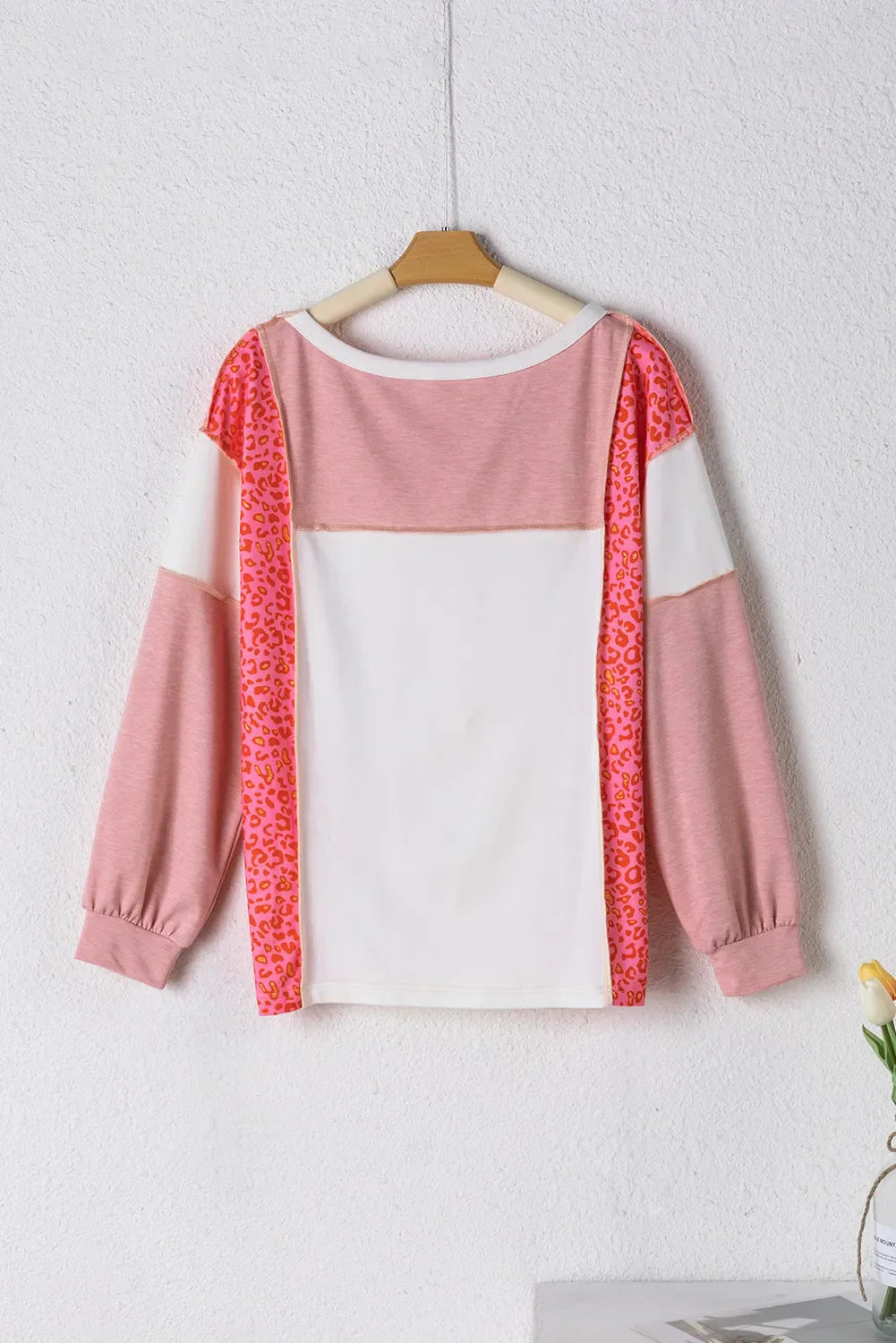 Ida | Exposed seam color block leopard print crew neck top