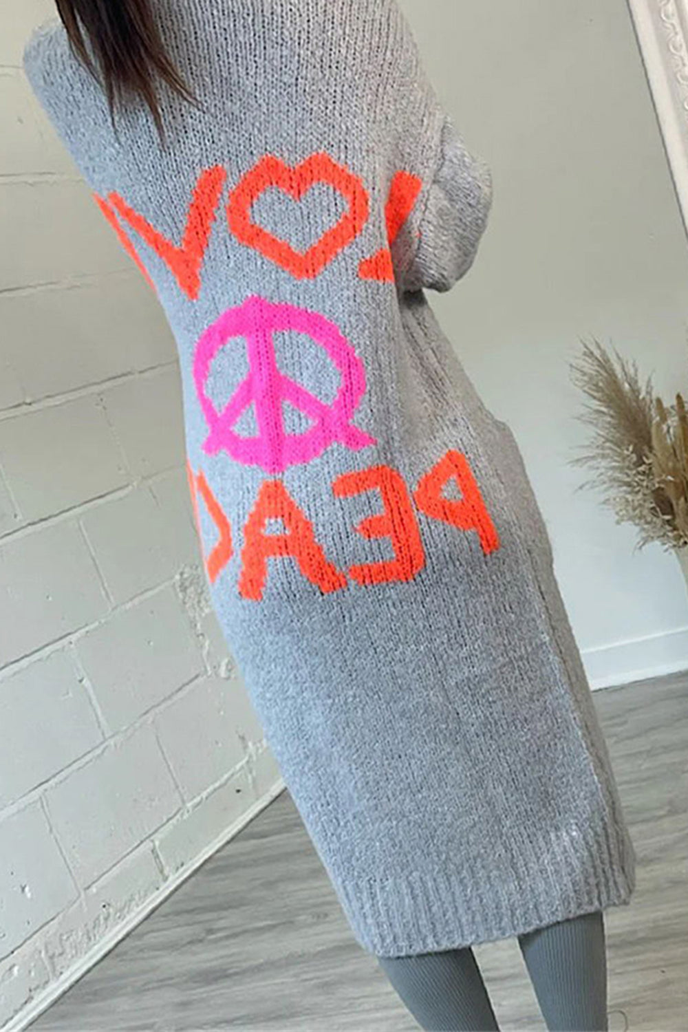 Clara | Long-sleeved peace sign cardigan