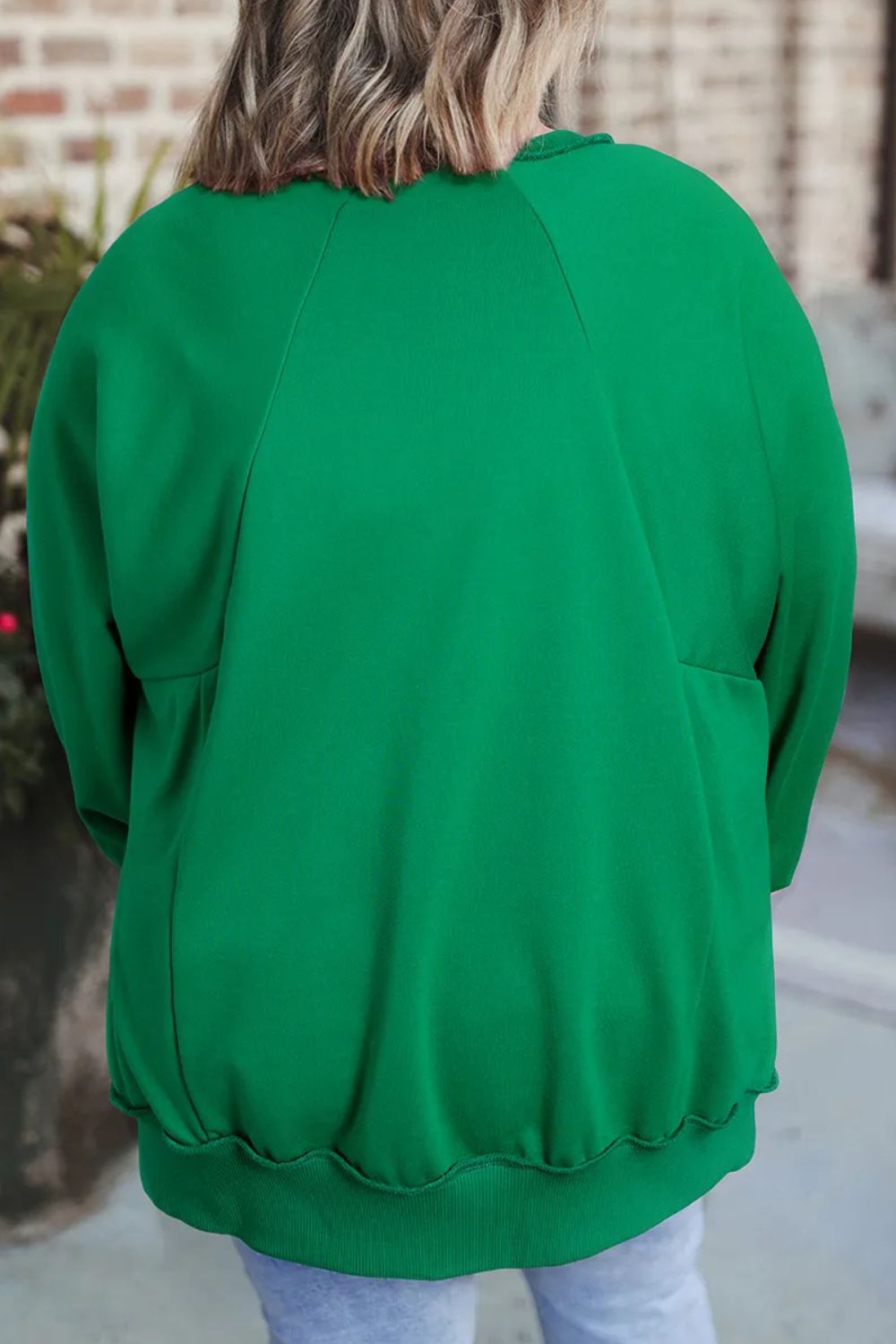 Yvonne | Plus size long sleeve sweatshirt with cutout hem and notched hem