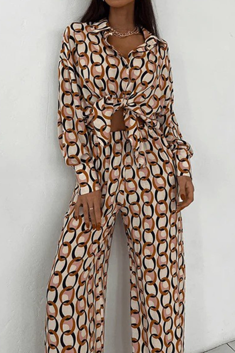 Julieta | Casual two-piece suit with geometric print and buttons, turn-down collar, long sleeves