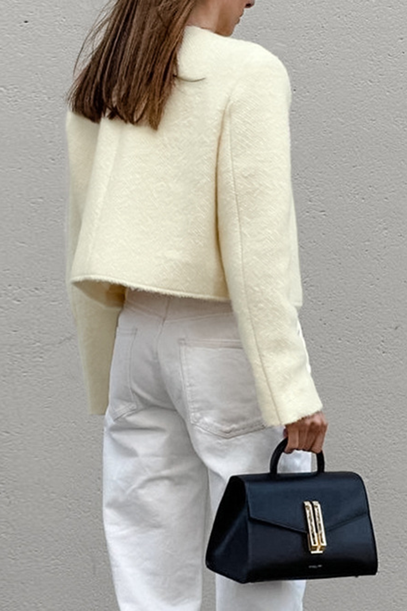 Concha | Casual everyday outerwear with solid color buttons and O-neck