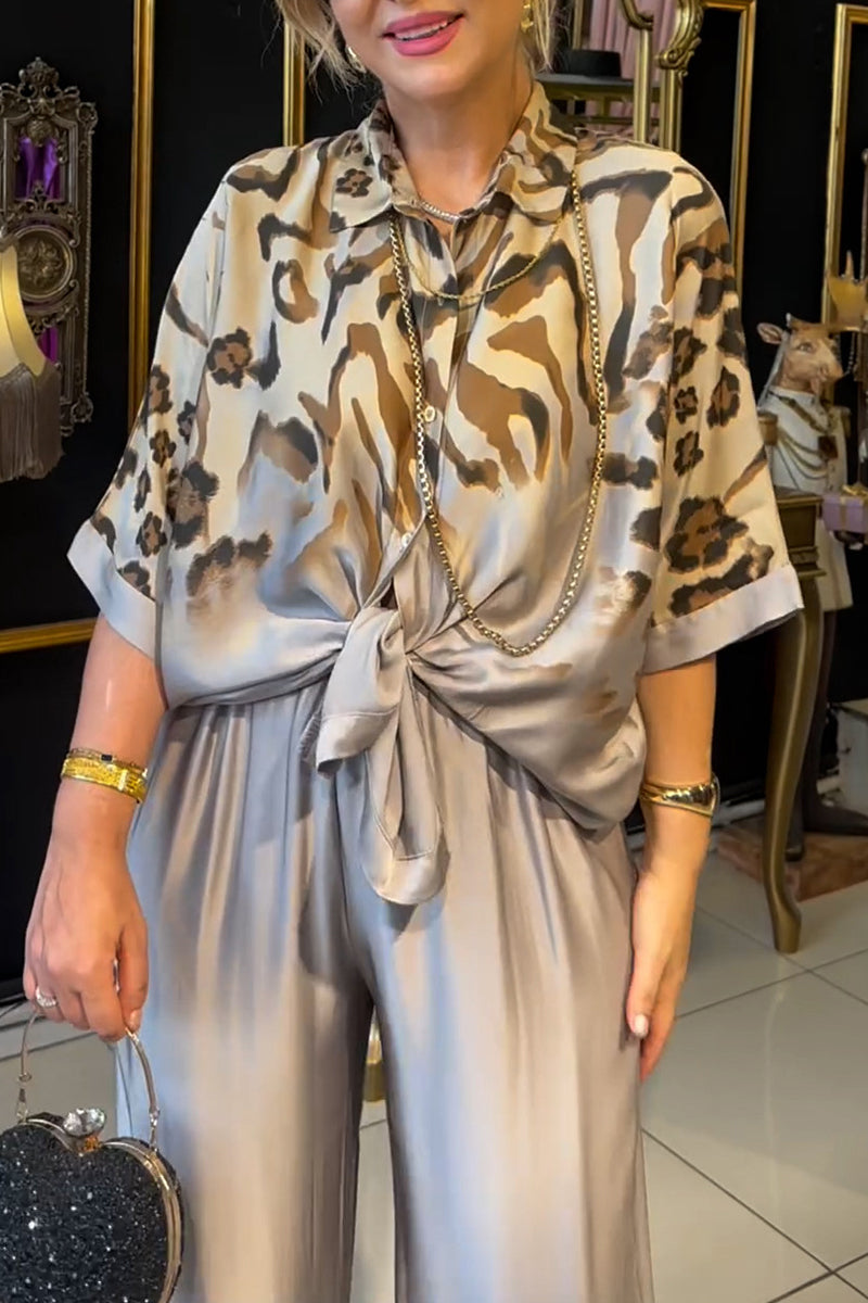 Krista | Casual two-piece suit with press studs, turn-down collar and long sleeves