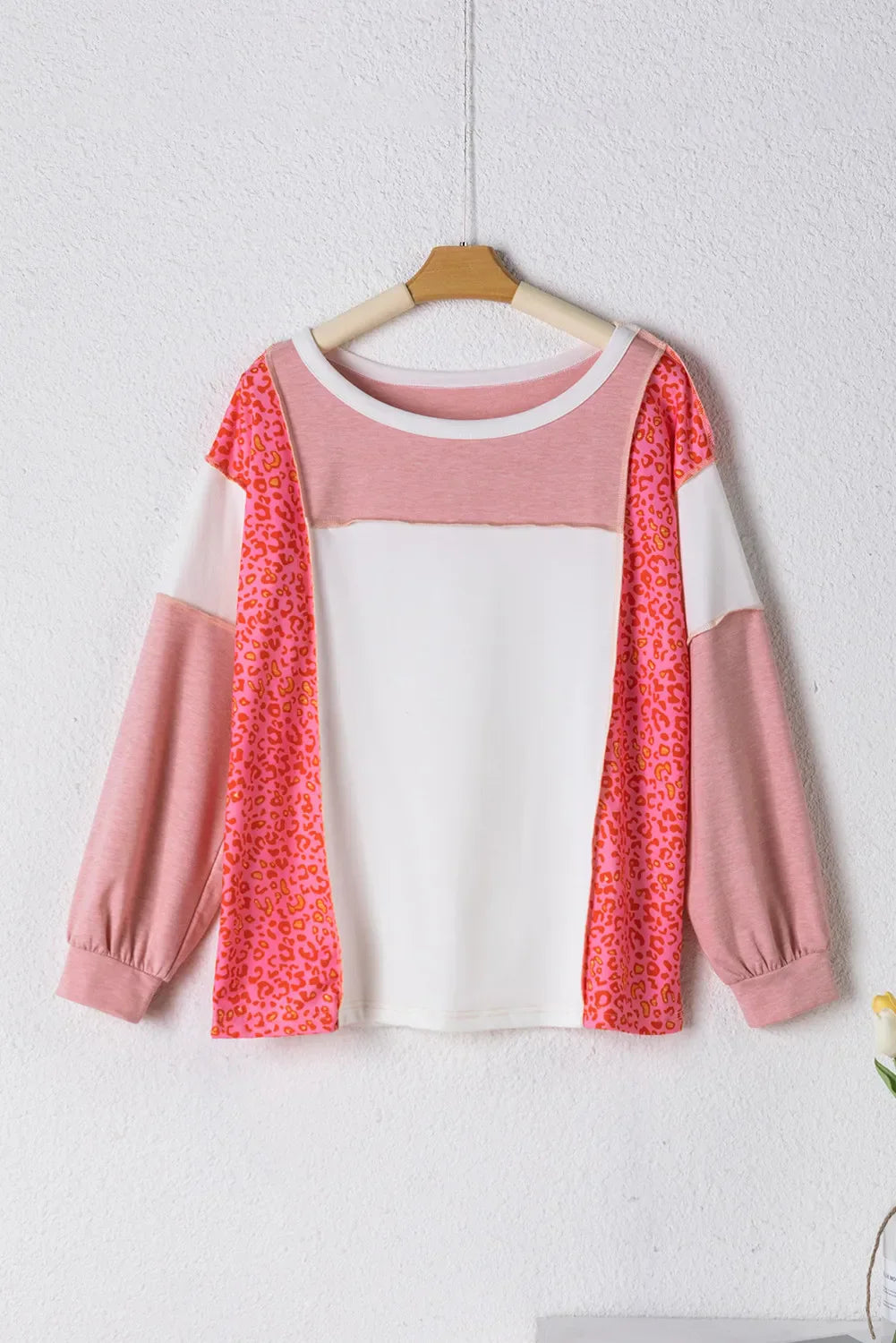 Ida | Exposed seam color block leopard print crew neck top