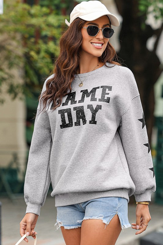 Paula | Black sweatshirt with Game Day graphics