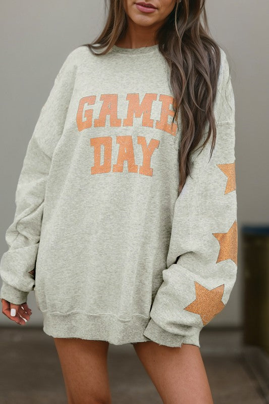 Paula | Black sweatshirt with Game Day graphics