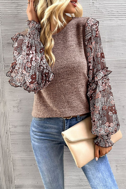 Aitana | Ruffled blouse with tiered floral sleeves and round neckline