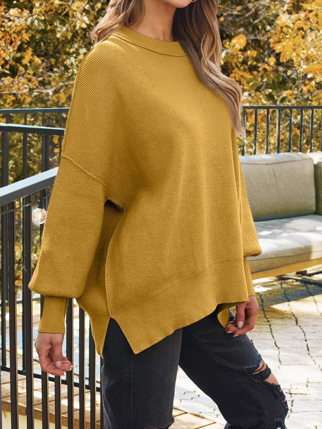 Evelyn | Slit sweater with a crew neck and dropped shoulders