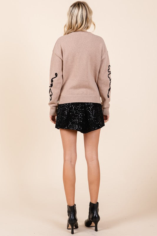 Adriana | Knitted sweater with floral embroidery
