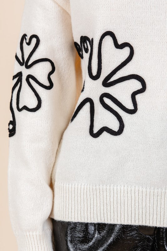 Adriana | Knitted sweater with floral embroidery