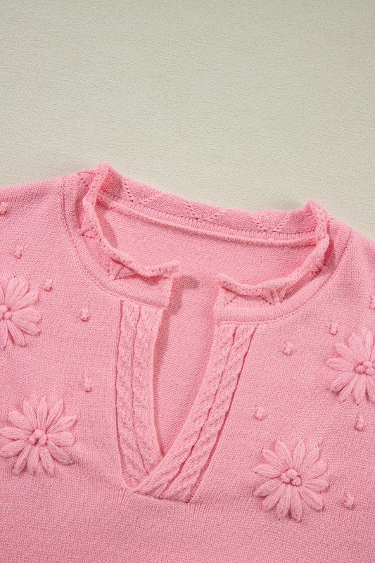 Doris | Knitted sweater with a notched neckline and a floral pattern