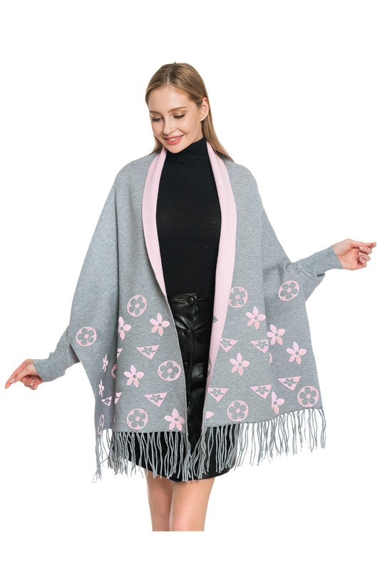 Tania | Shrug with geometric pattern and fringes