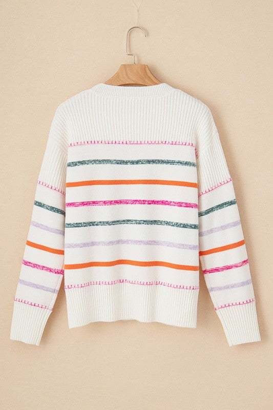Gabrielle | White, colorful striped sweater with a ribbed hem