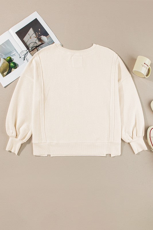 Flavia | Oversized bishop sleeve waffle knit sweatshirt