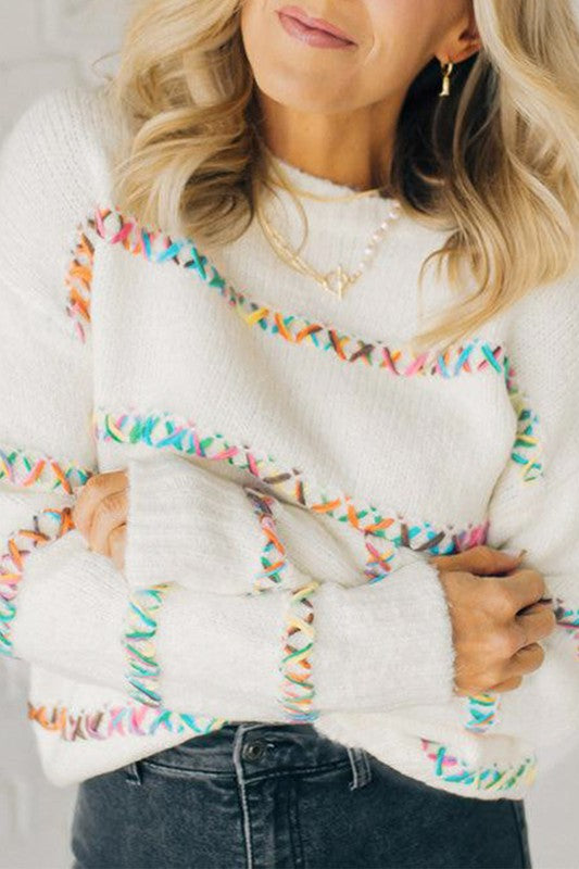 Tatiana | White sweater with crossed seams and dropped shoulders