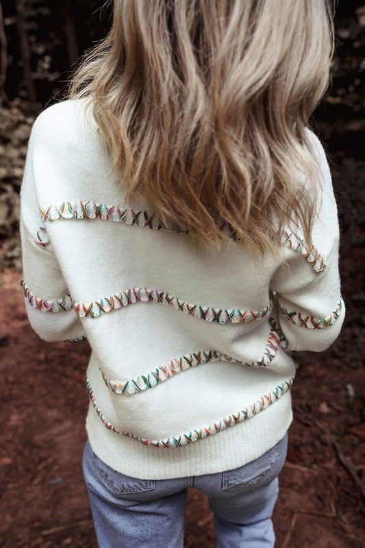 Tatiana | White sweater with crossed seams and dropped shoulders