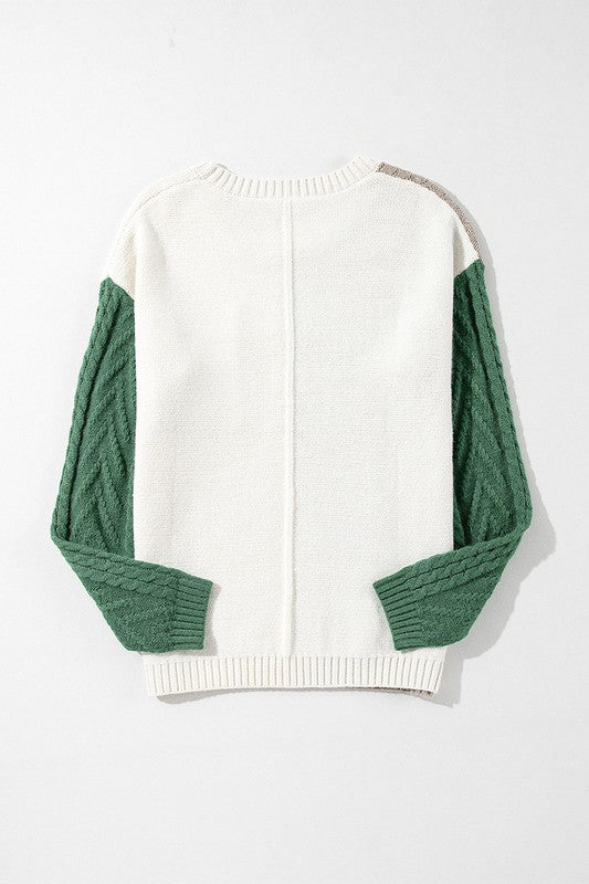 Antonia | Women's color block sweater with patch pockets on the shoulder