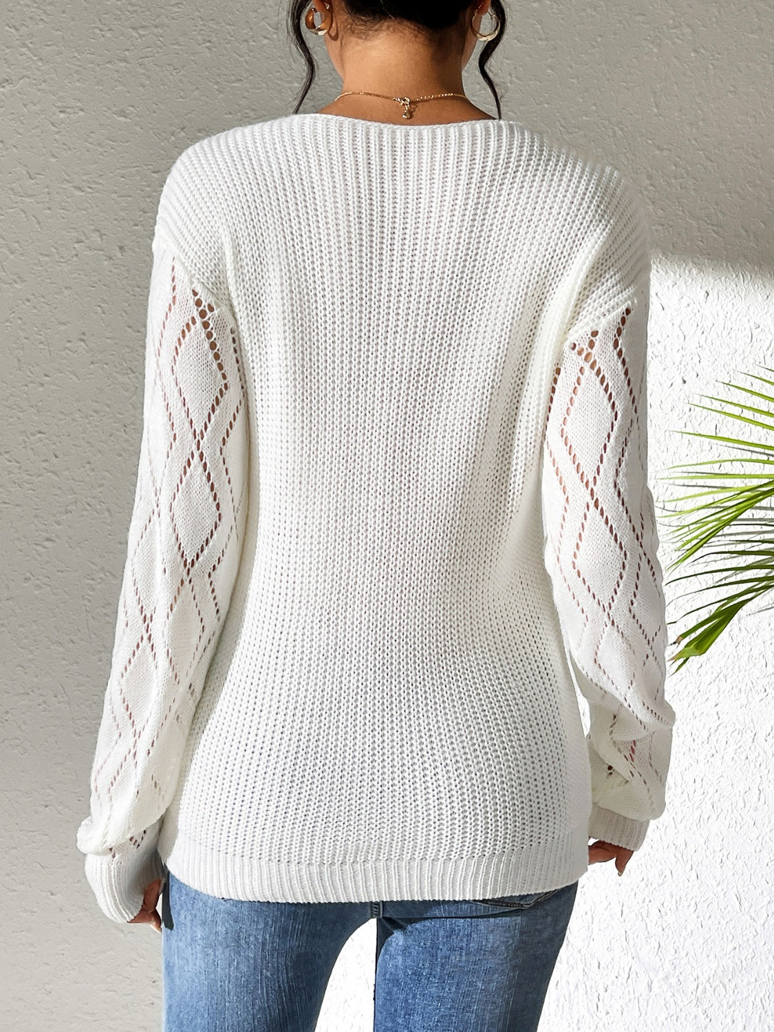 Lucrezia | Openwork sweater with a V-neck and long sleeves
