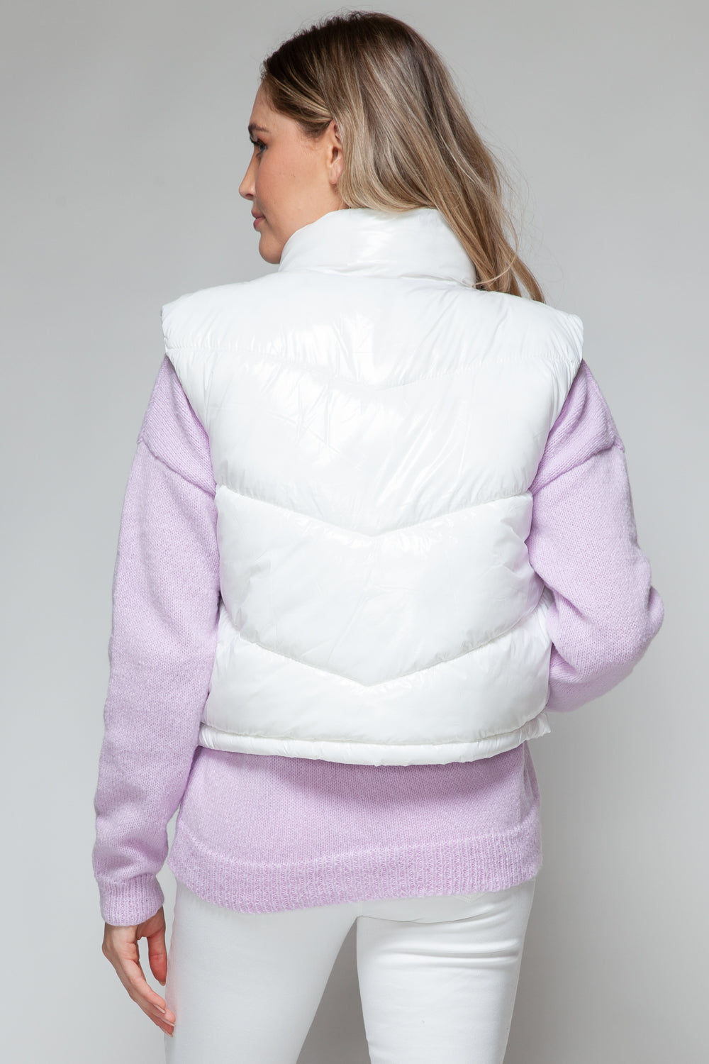 Milagros | Snobish shiny quilted vest with turtleneck and zip