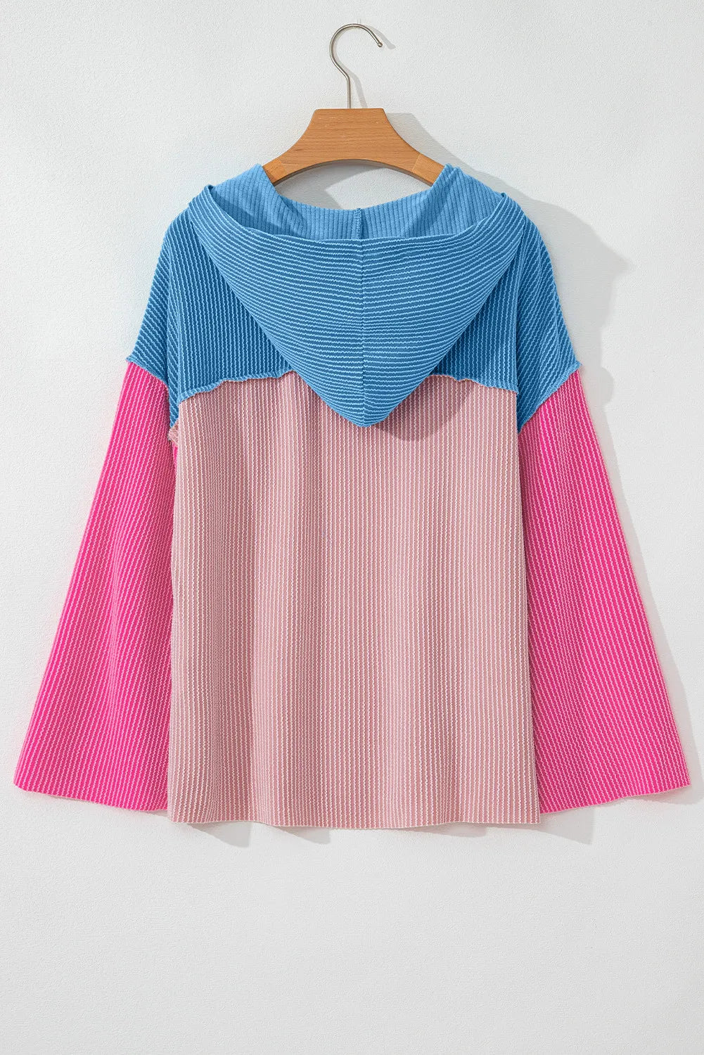 Greta | Long sleeve hoodie with a textured color block design