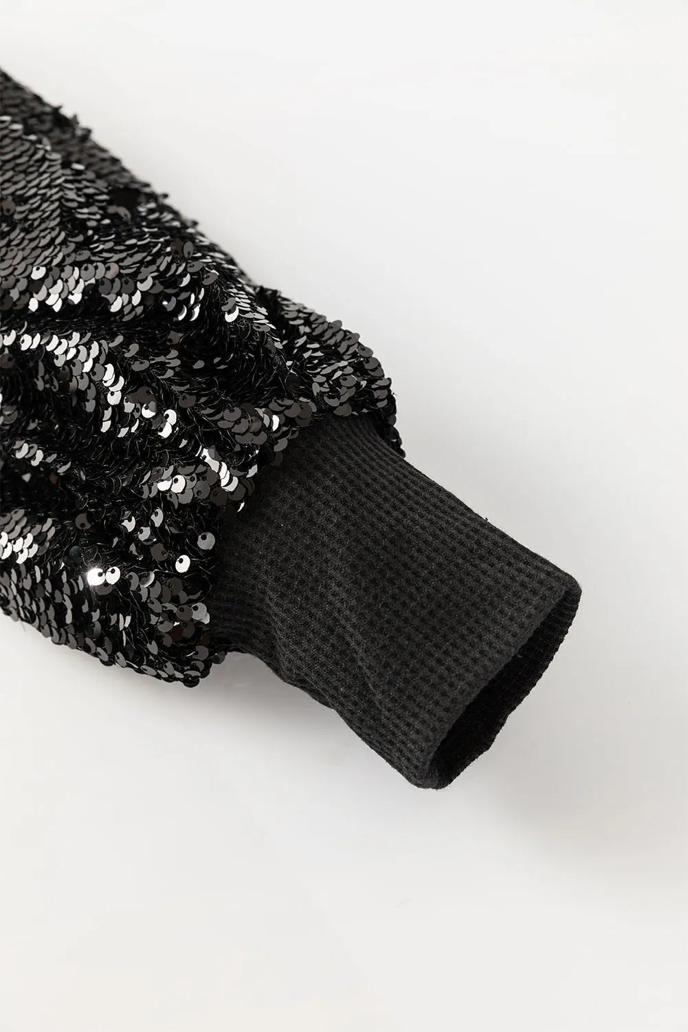 Ingrid | Long-sleeved blouse with sequins and a boat neckline
