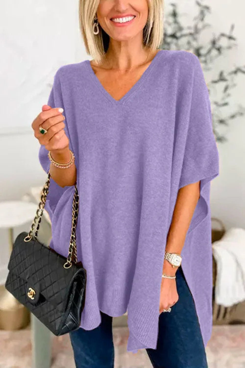 Erika | Slit knit top with V-neck and half sleeves