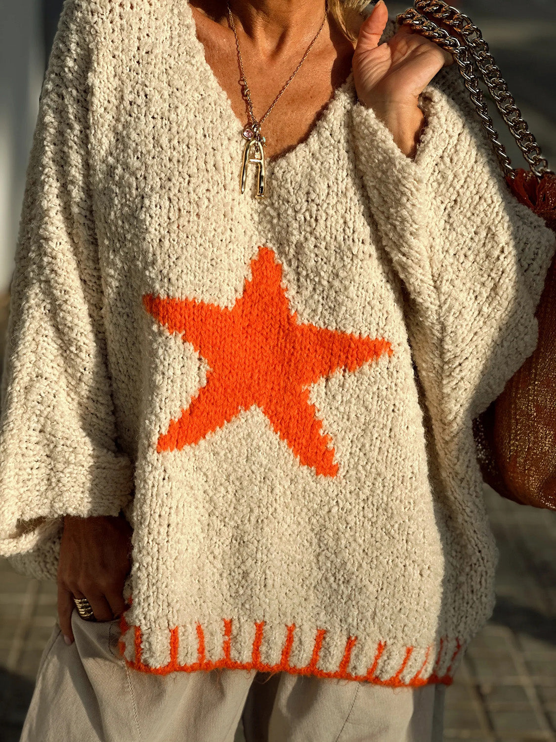Ingrid | Long-sleeved oversized sweater with a star V-neck