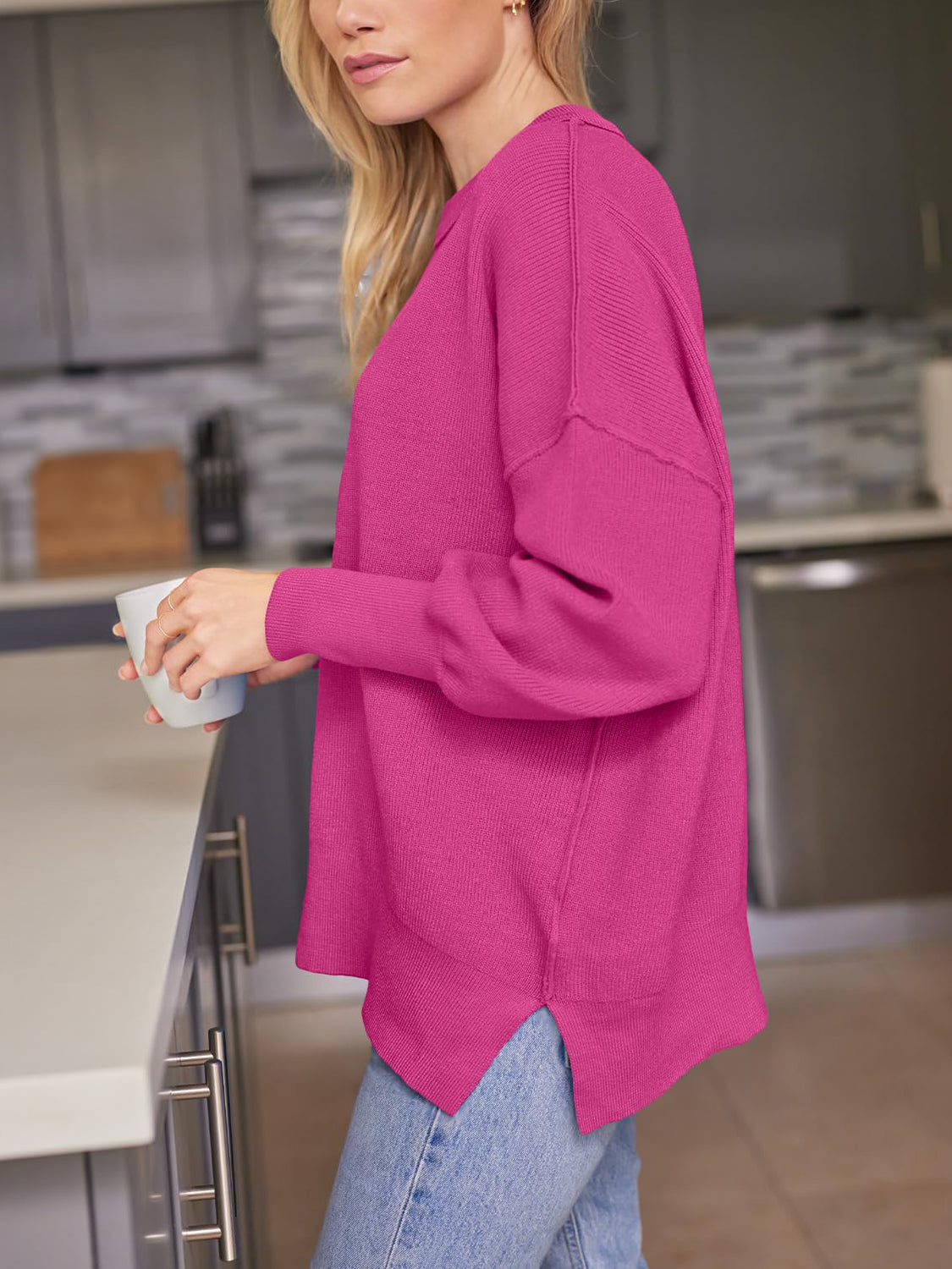 Evelyn | Slit sweater with a crew neck and dropped shoulders