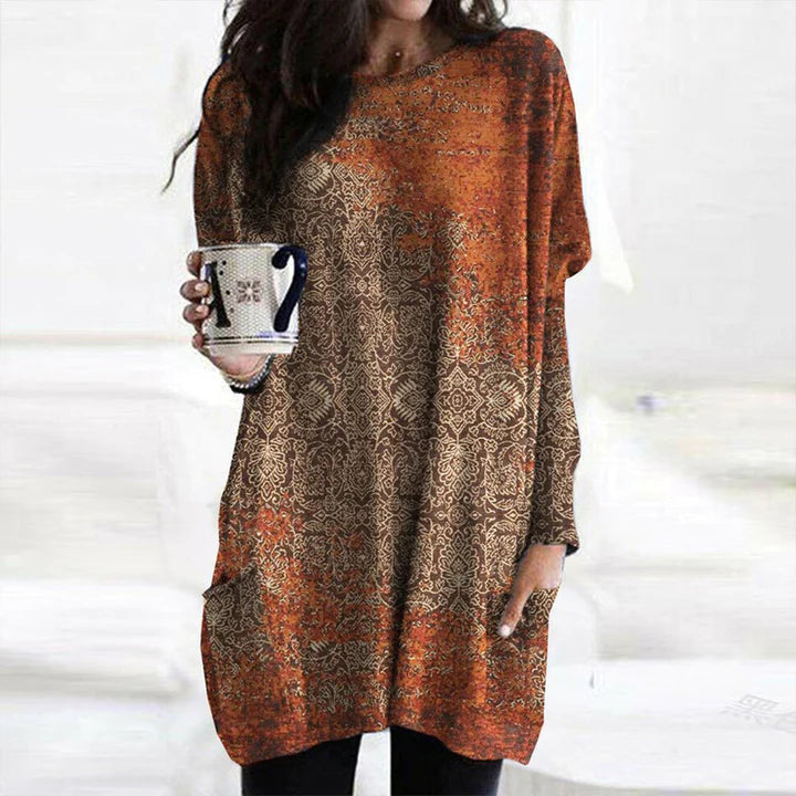 Yolante | Elegant orange sweater with a mandala print