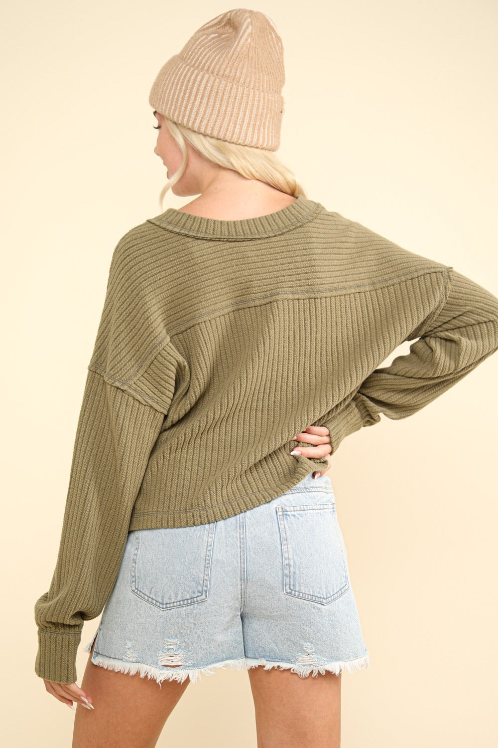 Amalia | Ribbed knit top with exposed seam and V-neckline