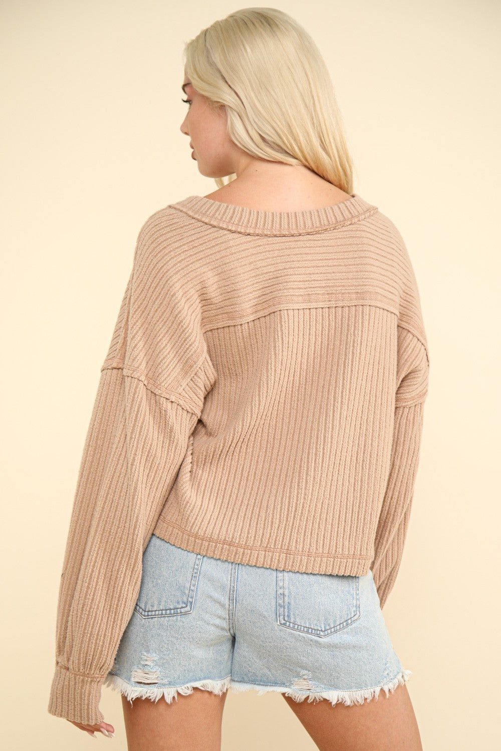 Hilda | Ribbed knit top with exposed seam and V-neck